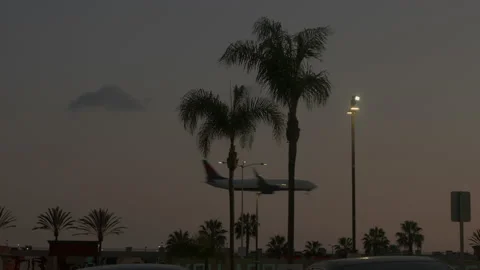 Airplane landing side view Stock Footage 169563708
