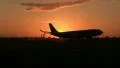 Airplane landing at sunrise HD Footage
