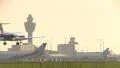 Airplane landing at sunrise HD Footage