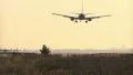 Airplane landing at sunrise HD Footage