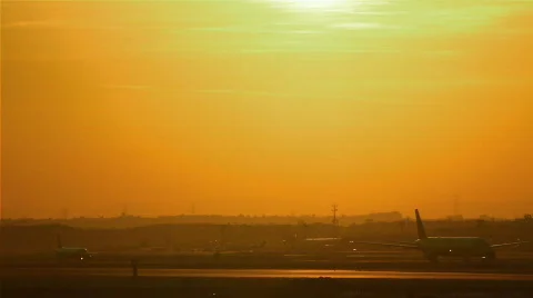 Airplane landing at sunset Stock Footage 866532