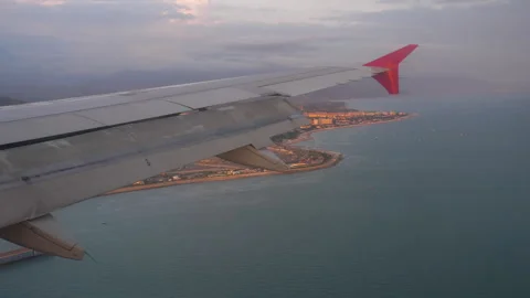 Airplane landing at sunset Stock Footage 273095037