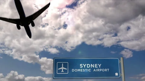 Airplane landing at Sydney domestic airport Stock Footage