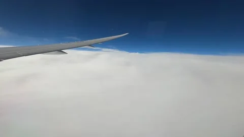 Airplane landing timelapse, view from the window on the wing and clouds Stock Footage 146941163