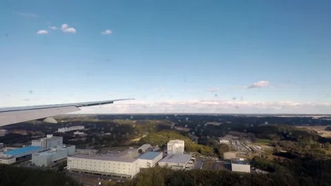 Airplane landing at Tokyo Narita International Airport in Japan. Stock Footage