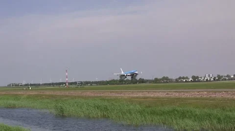 Airplane lands at Schiphol Amsterdam Stock Footage