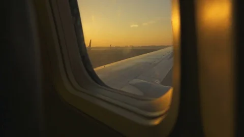 Airplane Left Wing, Dawn Stock Footage 73592634
