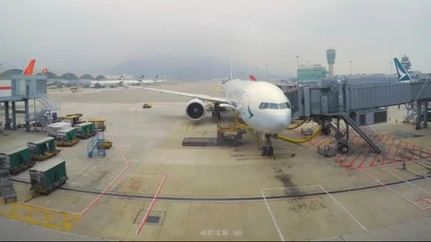 Airplane loading cargo Stock Footage 99676744