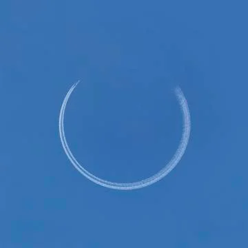 Airplane making circle trace Stock Photos