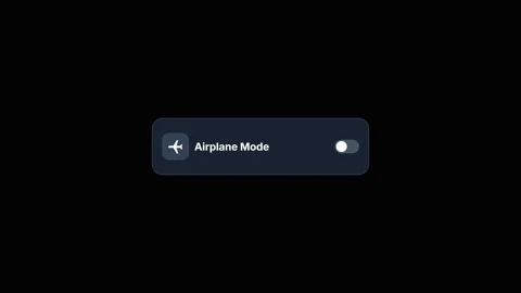 Airplane mode toggle switch activation on a dark digital interface. 4K 스톡 동영상 347269703