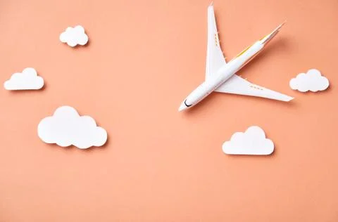 Airplane model and clouds. Fly by plane Stock Illustration