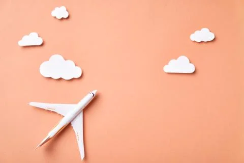 Airplane model and clouds. Fly by plane Stock Illustration