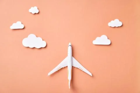 Airplane model and clouds. Fly by plane Stock Illustration