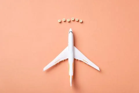 Airplane model and clouds. Text Travel. Fly by plane Stock Illustration