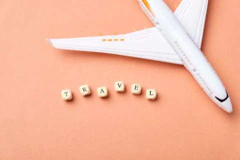 Airplane model and clouds. Text Travel. Fly by plane Stock Illustration