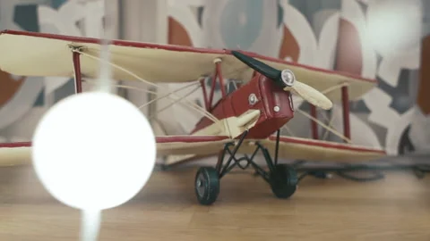 Airplane model on a shelf. Miniature copy of the aircraft, decoration Stock Footage 219645070