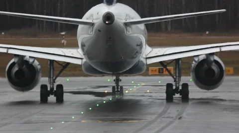 Airplane moving on the runway getting ready for takeoff Stock Footage 67676565
