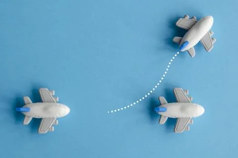 Airplane moving towards to a different direction. Courage or leadership conce Stock Photos