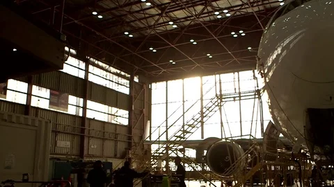 Airplane nose in hanger Видео 77129446