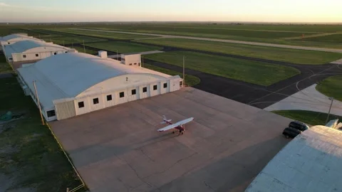 Airplane outside of hanger Stock Footage 240220725