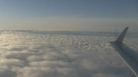 Airplane over clouds Stockbeeldmateriaal 584723