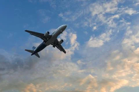 Airplane over the clouds Фото