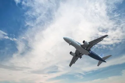 Airplane over the clouds Stockfoto's