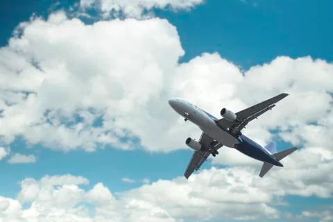 Airplane over the clouds Foto stock