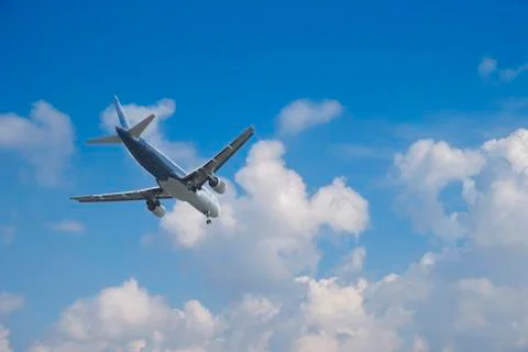 Airplane over the clouds, 库存照片