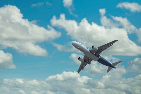 Airplane over the clouds Stockfoto's