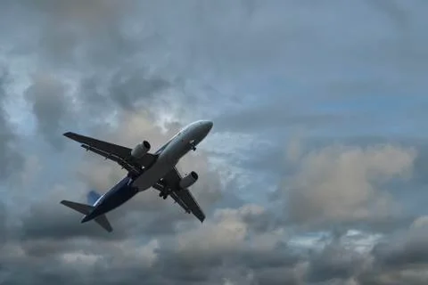 Airplane over the clouds Foto stock