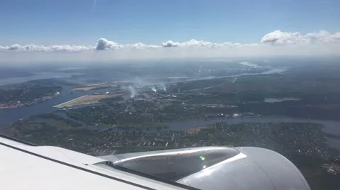 Airplane over Riga city harbor. Stock Footage 63908285