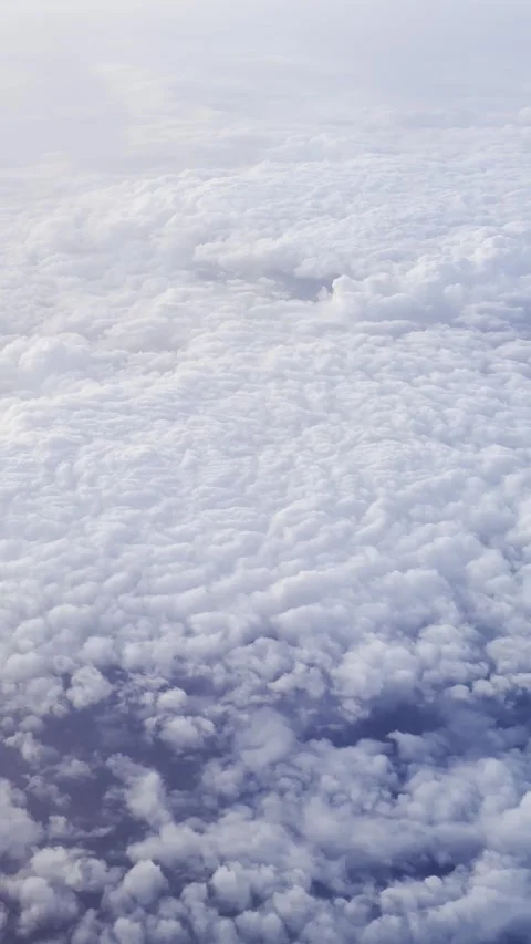 Airplane Over White Cloudscape in Beautiful Sky Landscape Stock Footage 330731393