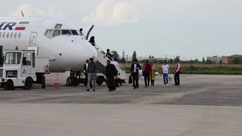 Airplane (Passengers get off the plane) 2 shots Stock Footage 147192920