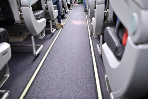 Airplane passengers Stock Photos