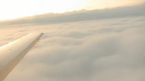Airplane passing clouds Stock Footage 584642