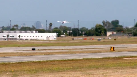 Airplane Picks Up Sign Stock Footage 113237808