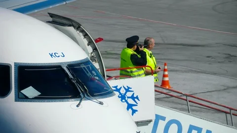 Airplane pilot is in the cockpit Stock Footage 99605697