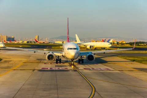 The airplane preparing to takeoff from runway Stock Photos