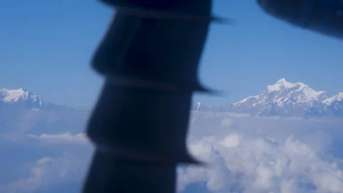Airplane propeller with a beautiful view of clouds and mountains Stock Footage 246702614