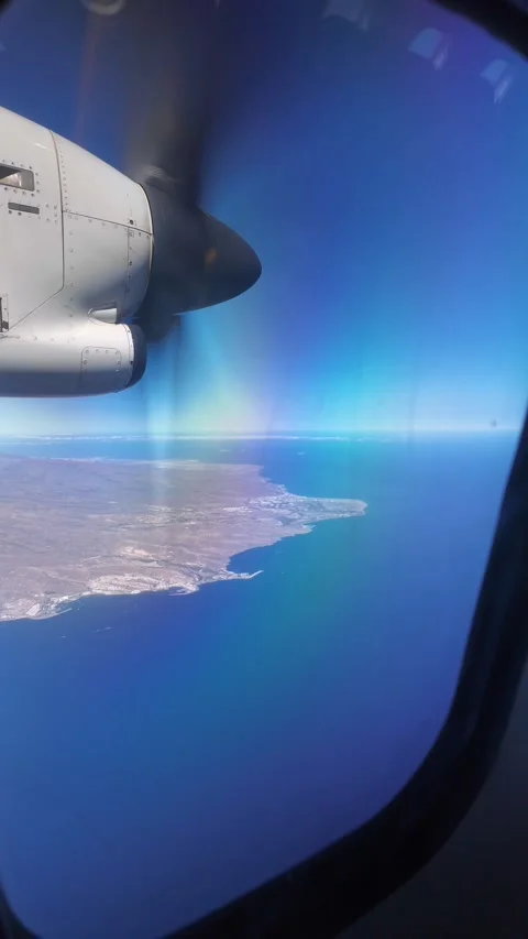 Airplane propeller flying over the coast of Gran Canaria Stock Footage 345362275