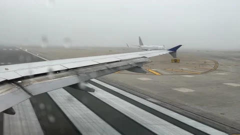 Airplane, rain, airport, runway, takeoff, departure, fly, wing, view, window, tr Vídeo Stock 221449953