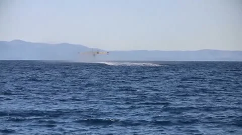 Airplane rises from the sea Stock Footage 8931982