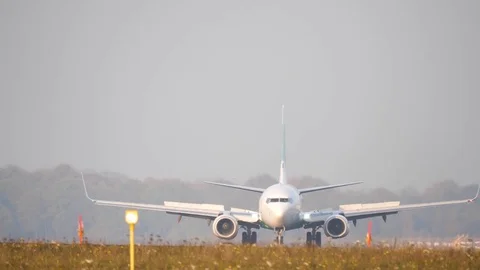 Airplane rolling down in runway Stock Footage 84419151