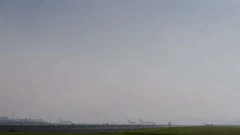 Airplane on runway preparing for takeoff Stock Footage 290521544