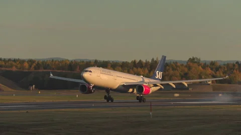 Airplane scandinavian airlines airbus a330 arrival oslo airport norway Stock Footage 219537970