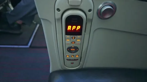Airplane Seat Control Panel Shaking During Turbulence In Aircraft Cabin Stock Footage 334358348