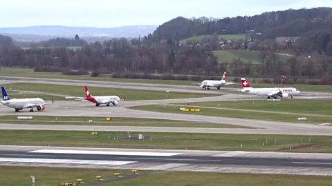 Airplane shown waiting queue for take off departure segment sas helvetic Stock Footage 300186738