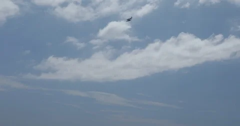Airplane in the sky above the beach Stock Footage 86623556