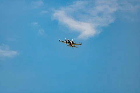 An airplane in the sky Stock Photos